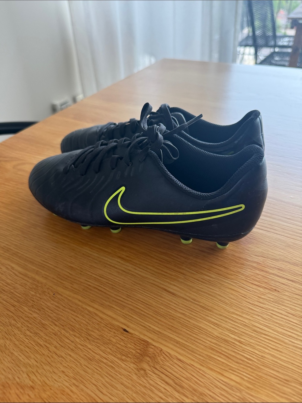 Nike Kids Black Soccer Cleats with Neon Yellow Swoosh